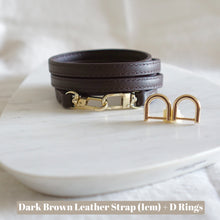 Load image into Gallery viewer, Luxegarde’s D Rings are perfect for converting small leather goods that don’t have existing metal loops to clip on chains, but do have e.g. a leather tab onto which the D Rings can be attached. Suitable for Louis Vuitton Cosmetic Pouch, Nice Nano, Mini Nano etc. Customise with a leather strap!