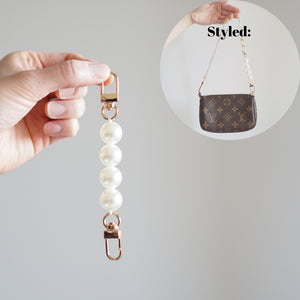 Luxegarde’s Pearl Strap Extender is the perfect accessory to extend the strap of your existing bag so you can wear it in different ways. Perfect for those who want to wear their Chanel Coco Handle bag crossbody but need the extra length, or want to wear the Louis Vuitton Mini Pochette Accessoires as a shoulder bag!