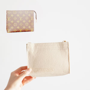 Our Toiletry Pouch 19 Bag Shaper / Organizer is the ultimate accessory for this Louis Vuitton Pouch! It will help to convert the Pouch into a crossbody bag, maintain the shape and prevent keys and pens from marking the bottom. You can add our 24k Gold-Plated Chain or Premium Gold Chain to finish the look!