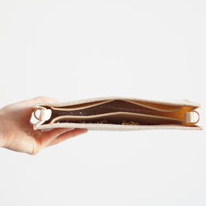 Our Toiletry Pouch 26 Bag Shaper / Organizer is the ultimate accessory for this Louis Vuitton Pouch! It will help to convert the Pouch into a crossbody bag, maintain the shape and prevent keys and pens from marking the bottom. Add a Chunky Gold Chain Strap for the ultimate fashion statement!