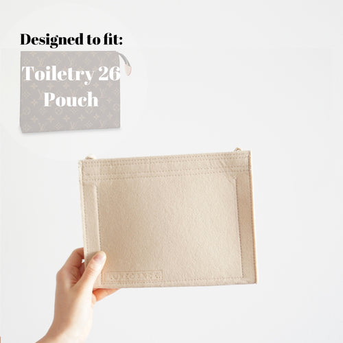 Luxegarde's Louis Vuitton Toiletry Pouch 26 Bag Shaper / Organizer allows you to convert the Louis Vuitton Toiletry Pouch 26 into a crossbody bag, maintain the shape and prevent keys and pens from marking the interior.  You can add one of Luxegarde's straps to the Toiletry Pouch 26 felt insert to complete the look!