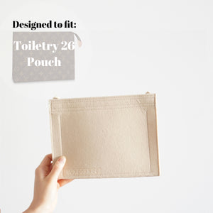 Luxegarde's Louis Vuitton Toiletry Pouch 26 Bag Shaper / Organizer allows you to convert the Louis Vuitton Toiletry Pouch 26 into a crossbody bag, maintain the shape and prevent keys and pens from marking the interior.  You can add one of Luxegarde's straps to the Toiletry Pouch 26 felt insert to complete the look!