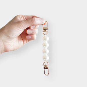 Luxegarde’s Pearl Strap Extender is the perfect accessory to extend the strap of your existing bag so you can wear it in different ways. Perfect for those who want to wear their Chanel Coco Handle bag crossbody but need the extra length, or want to wear the Louis Vuitton Mini Pochette Accessoires as a shoulder bag!