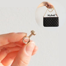 Load image into Gallery viewer, Our Pouch Converter Ring is perfect for turning your pouches into a wristlet or crossbody bag. Perfect for any pouches - including Chanel O Case, Chanel Pouch, Louis Vuitton Key Pouch, or Louis Vuitton Neverfull Pochette