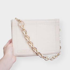 Our Toiletry Pouch 26 Bag Shaper / Organizer is the ultimate accessory for this Louis Vuitton Pouch! It will help to convert the Pouch into a crossbody bag, maintain the shape and prevent keys and pens from marking the bottom. Add a Chunky Oval Gold Chain Strap for the ultimate fashion statement!