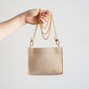 Our Toiletry Pouch 19 Bag Shaper / Organizer is the ultimate accessory for this Louis Vuitton Pouch! It will help to convert the Pouch into a crossbody bag, maintain the shape and prevent keys and pens from marking the bottom. You can add our 24k Gold-Plated Chain or Premium Gold Chain to finish the look!