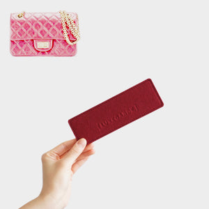 Luxegarde's Chanel Mini Reissue Flap Base Shaper will help to maintain the base shape of the purse, prevent sagging, and increase amount of space in the bag. The Mini Reissue felt base insert prevent keys and pens from scratching.